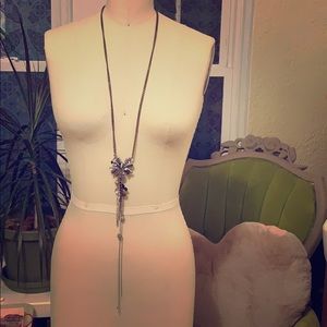Long bow necklace